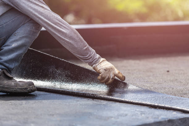 Professional Waterproofing technician working in Glen Cove, NY